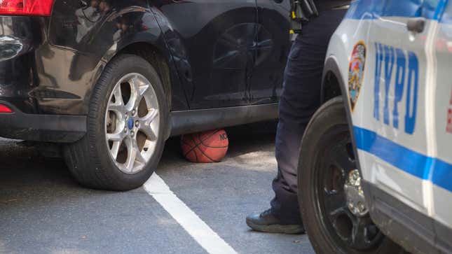 A basketball is seen under a car which struck a child on Lafayette Avenue and Classon Avenue in Brooklyn, New York City on Tuesday, June 27, 2023.