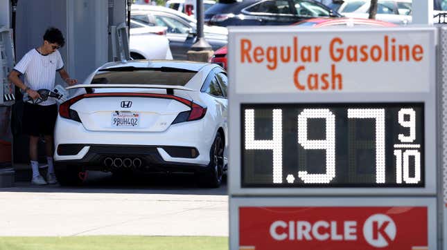 A customer prepares to pump gas into his car at a 76 gas station on July 26, 2023 in San Anselmo, California